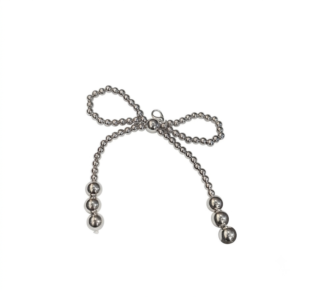 CHARM.1 Charm de tenis moña plateada