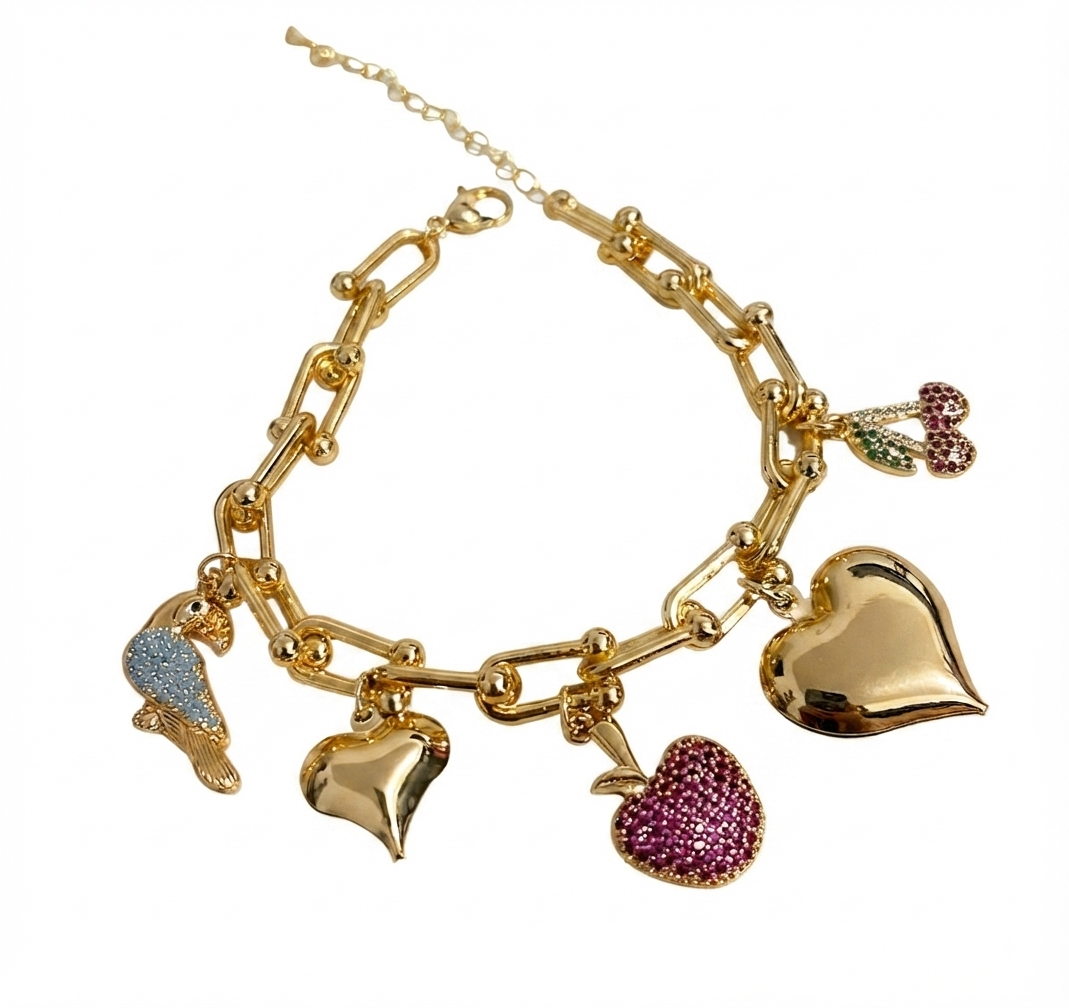 Baño de oro 18K.122 Pulsera de corazón, tucán, manzana y cereza baño de oro