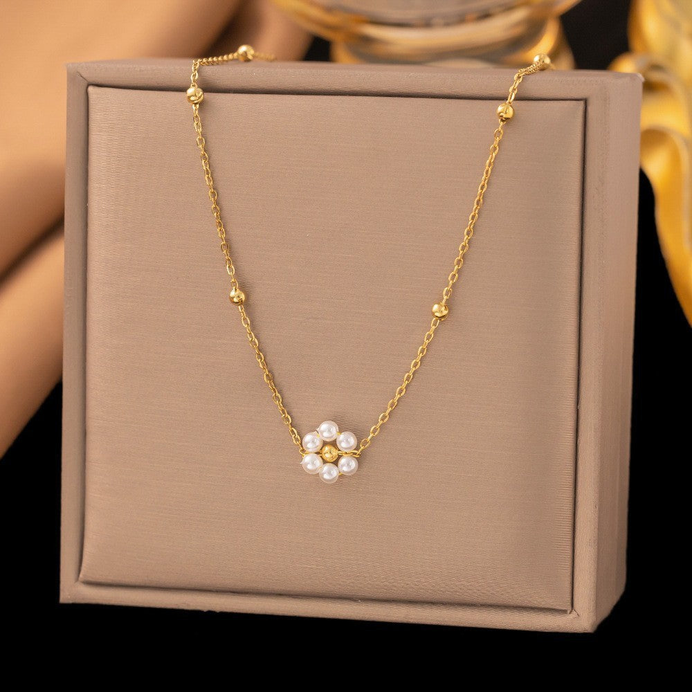 Baño de oro 18k.263 Cadena de florecita con perlitas blancas