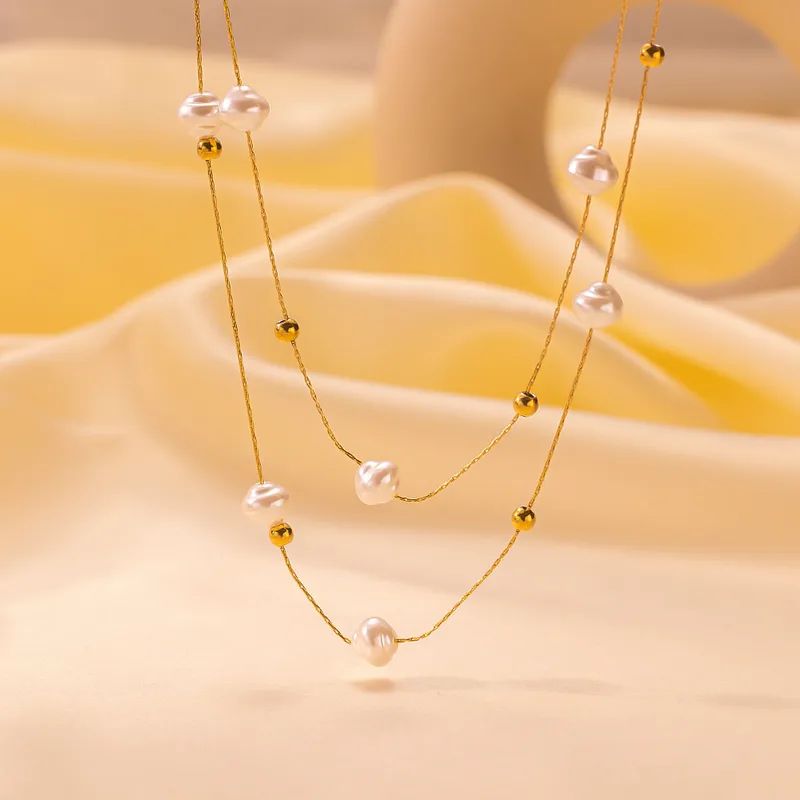 Baño de oro 18k.271 Collar doble con perlas blancas y doradas