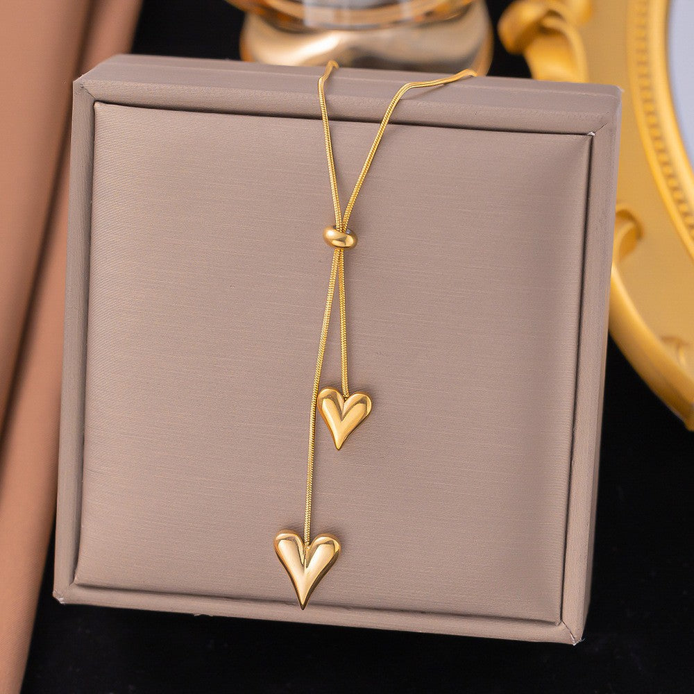 Baño de oro 18K.270 Collar de doble corazón dorado