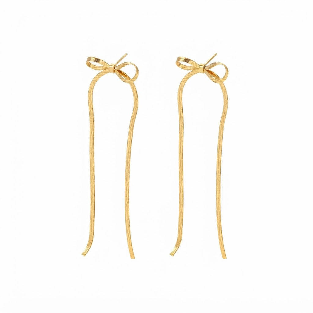 Baño de oro 18K.97 Aretes largos de moña dorada