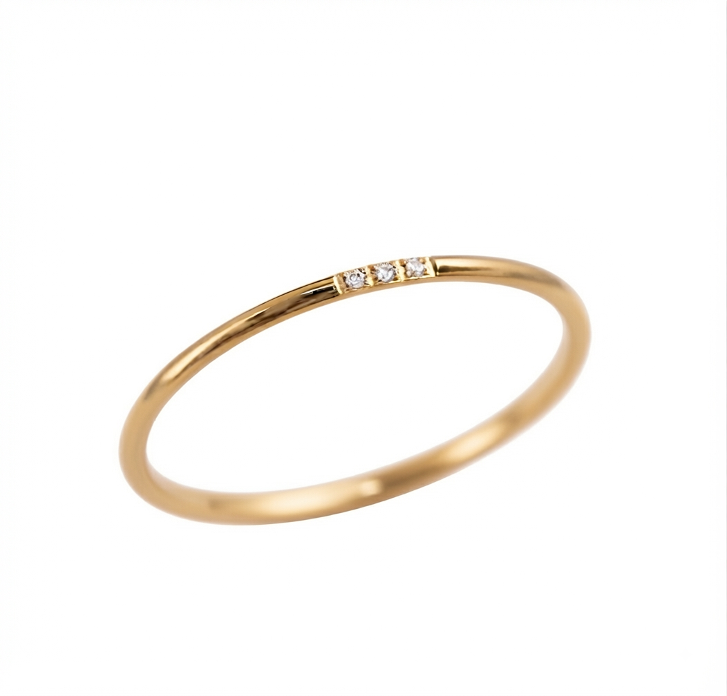 Baño de oro 18K.202 Anillo dorado con tres circonias talla 7