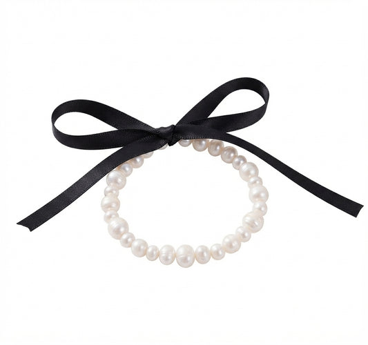 Fantasía fina PUL.50 Pulsera de perlitas y moña negra