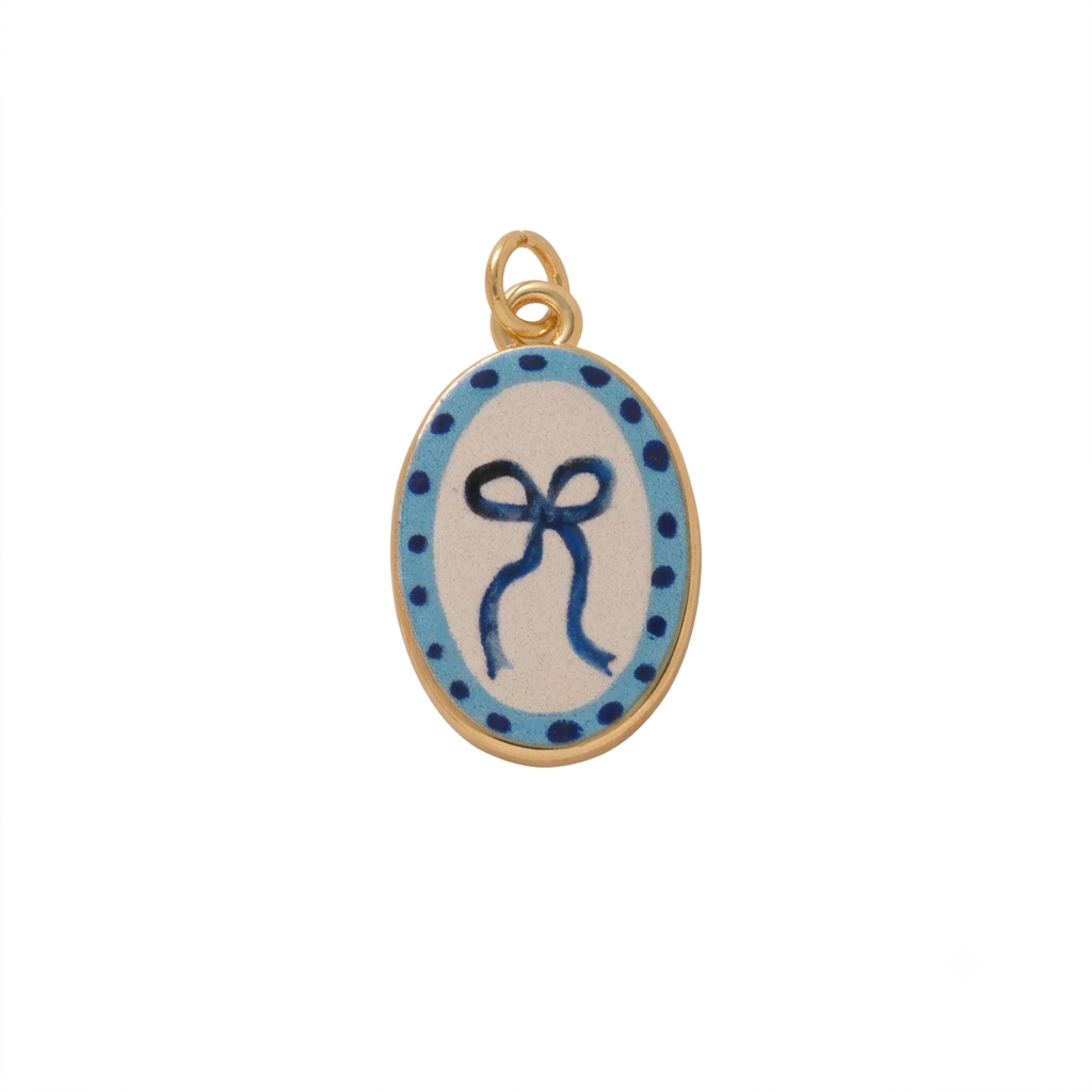 CHARM.36 Charm de moño azul