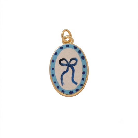 CHARM.36 Charm de moño azul