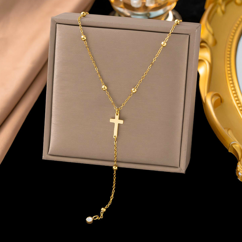 Baño de oro 18k.268 Collar de cruz con perlitas doradas