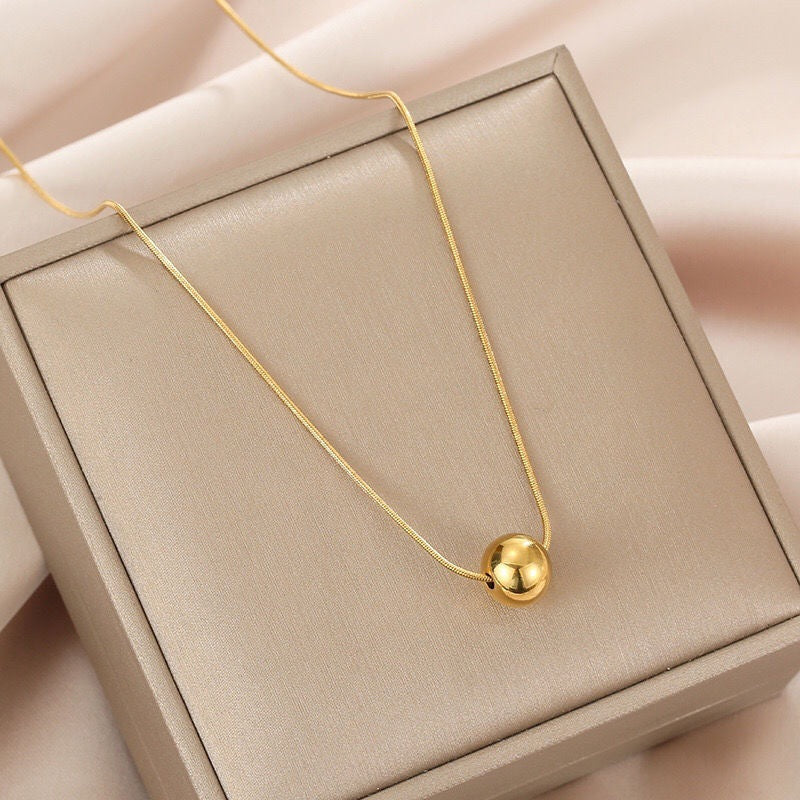 Baño de oro 18k.65 Collar de perla dorada
