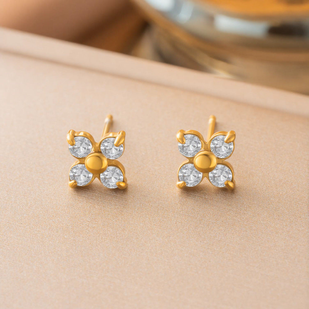 Baño de oro 18k.278 Aretes de florecitas con circonias